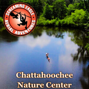 person zip lining over a lake at Chattahoochee Nature Center